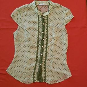 Green polkadot blouse